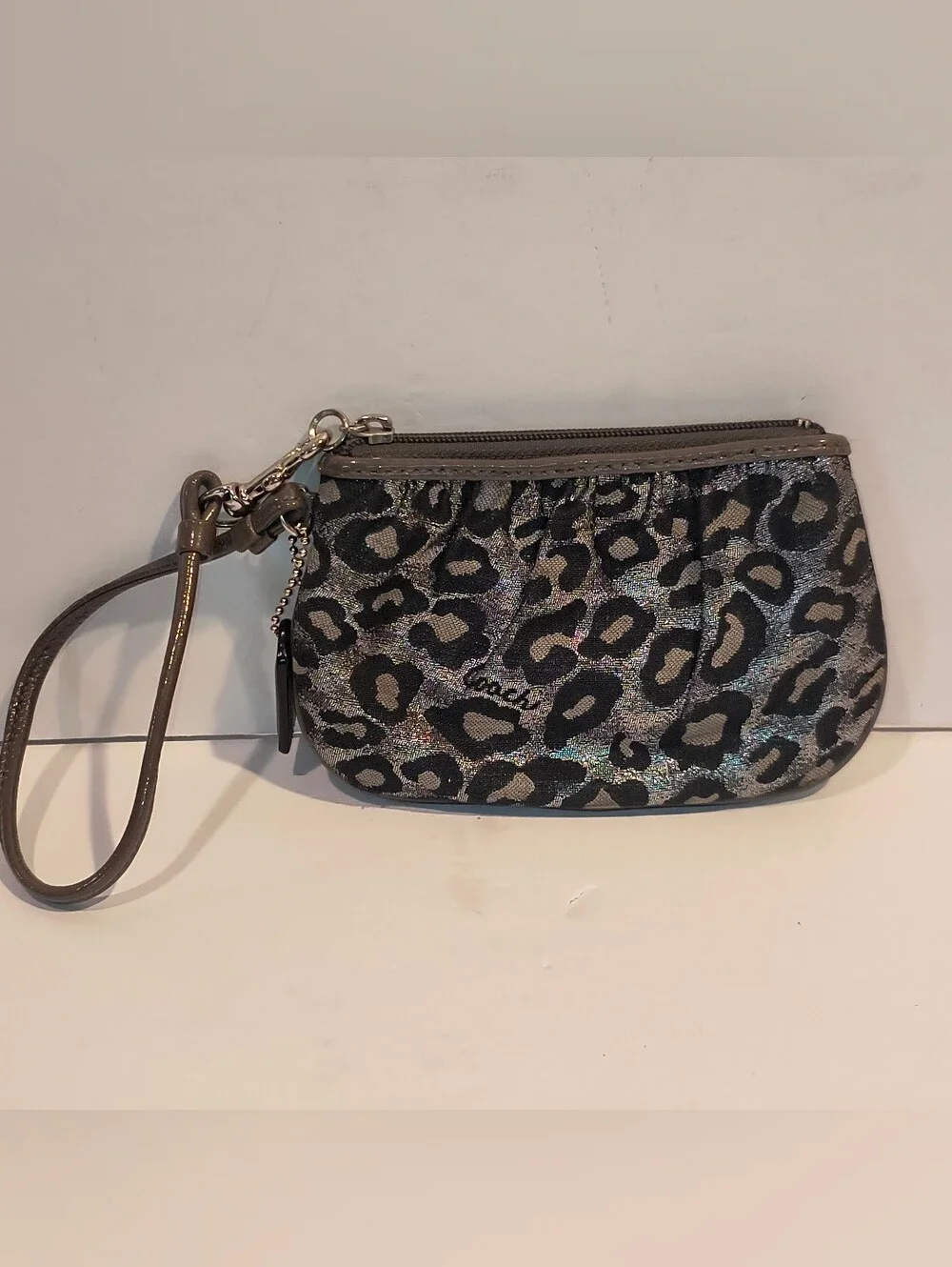 Coach Metallic Ocelot Leopard Print Mini Wristlet Pouch Silver Grey